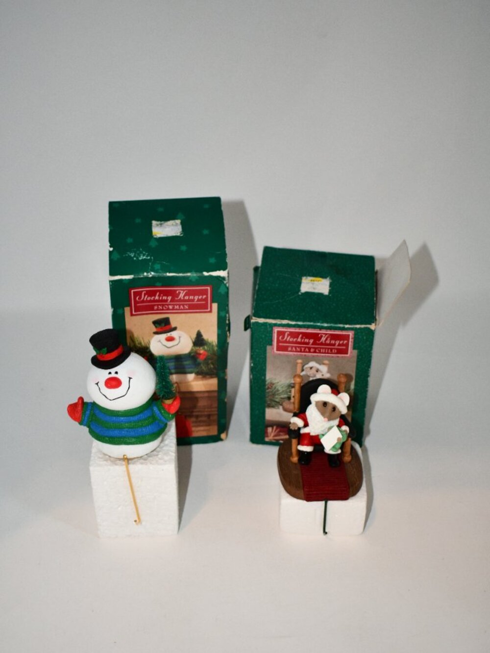 Vintage Christmas Stocking Hangers Lot of 2 Snowman Santa & Child Boxed  Descrip